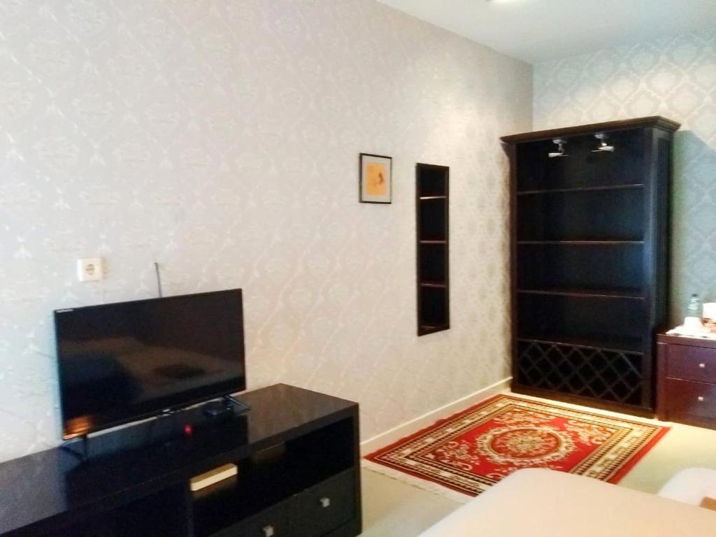 TV a/nebo společenská místnost v ubytování Jos & Hanny Homestay
