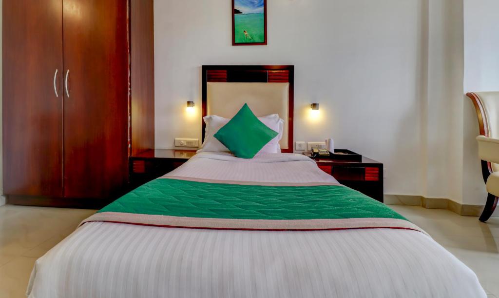 Postel nebo postele na pokoji v ubytování Hotel Luciya
