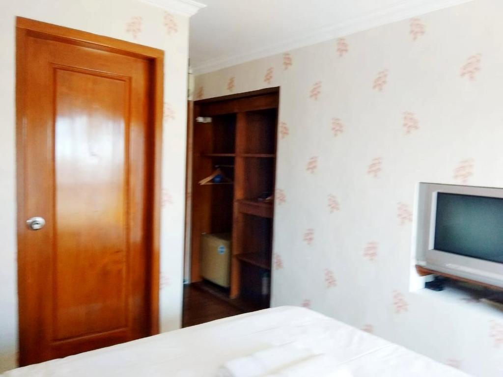TV a/nebo společenská místnost v ubytování Jos & Hanny Homestay