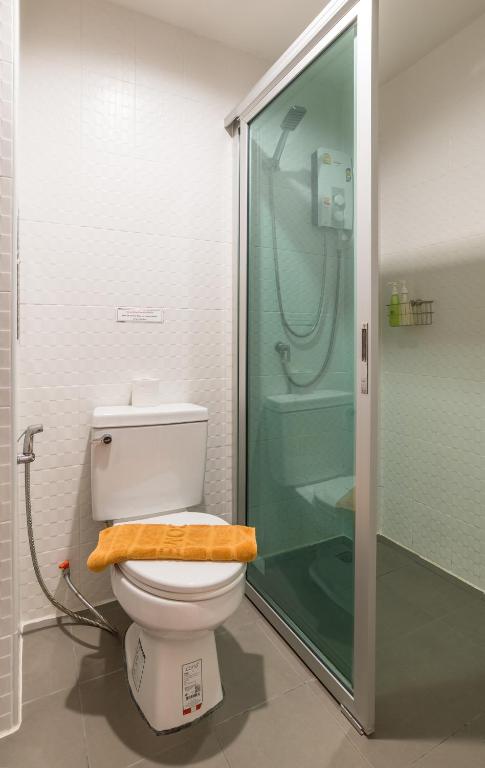 Koupelna v ubytování Lada Krabi Residence Hotel - SHA Plus