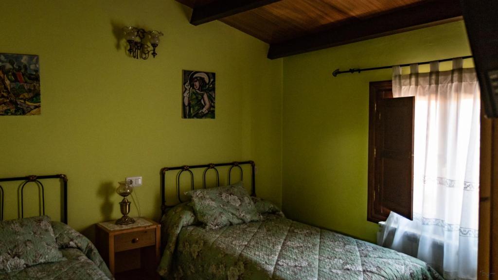 Posteľ alebo postele v izbe v ubytovaní Casa Rural Nestazar II