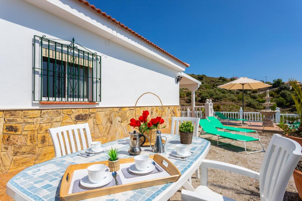 A balcony or terrace at Cortijo Torrox Escape