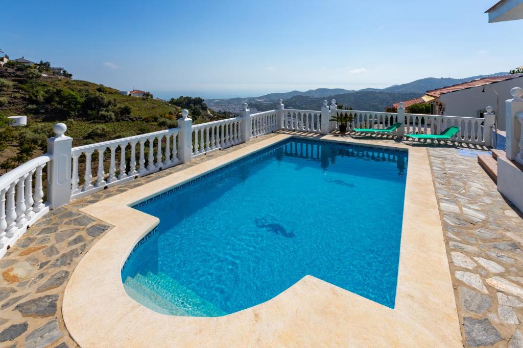 The swimming pool at or close to Cortijo Torrox Escape