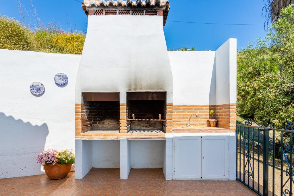 A balcony or terrace at Cortijo Torrox Escape