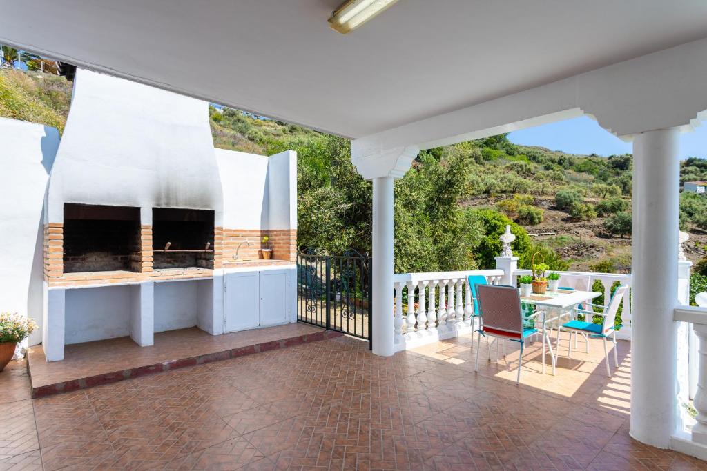 A balcony or terrace at Cortijo Torrox Escape