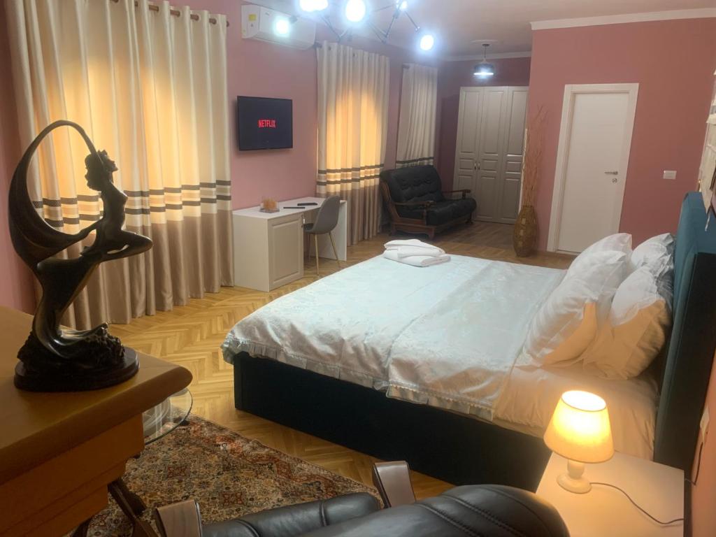 Postel nebo postele na pokoji v ubytování BELUX HOTEL