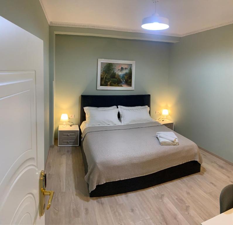 Postel nebo postele na pokoji v ubytování BELUX HOTEL