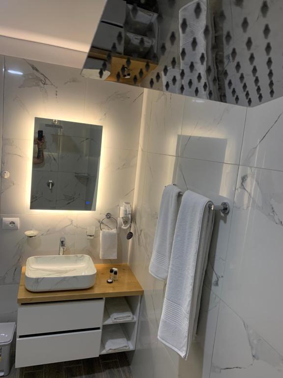 Koupelna v ubytování BELUX HOTEL