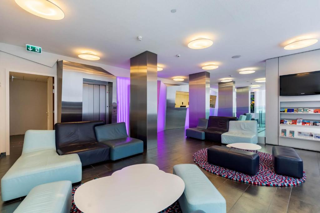 TV a/nebo společenská místnost v ubytování Hotel Cristal Design