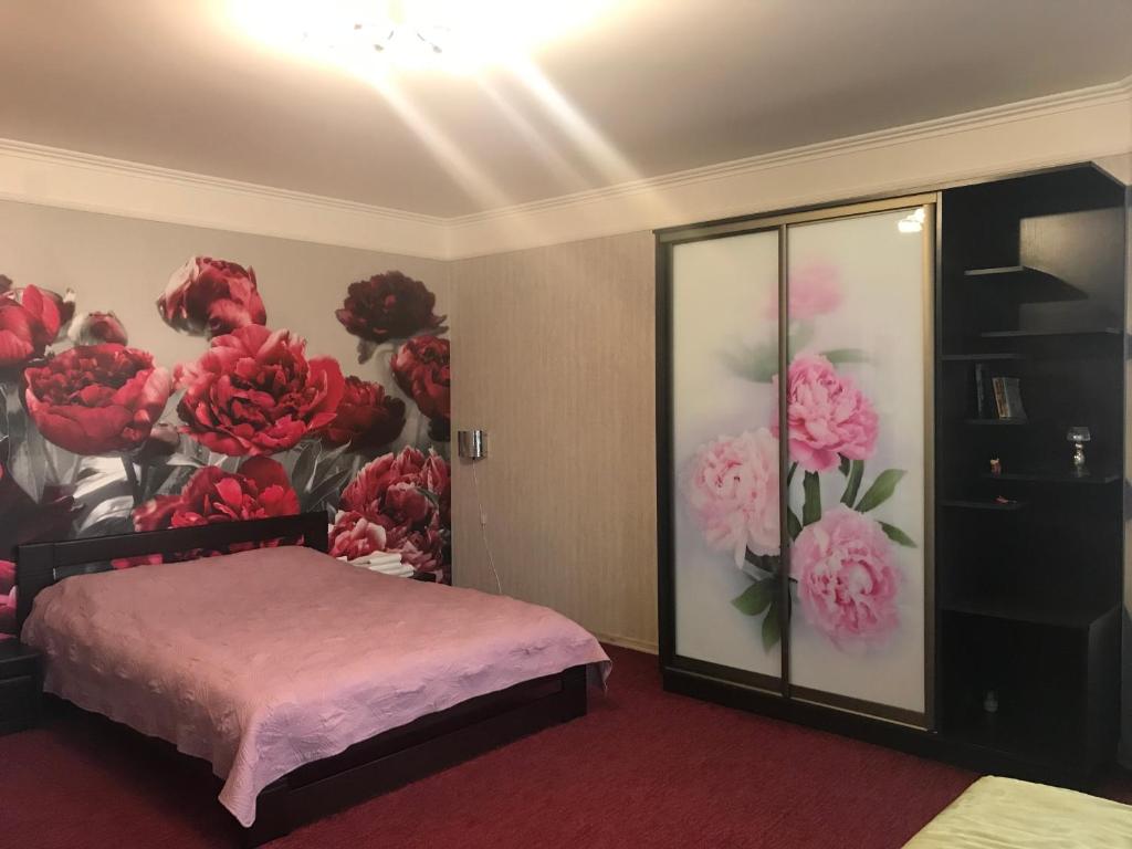 Postel nebo postele na pokoji v ubytování Polyanskiy Zamok