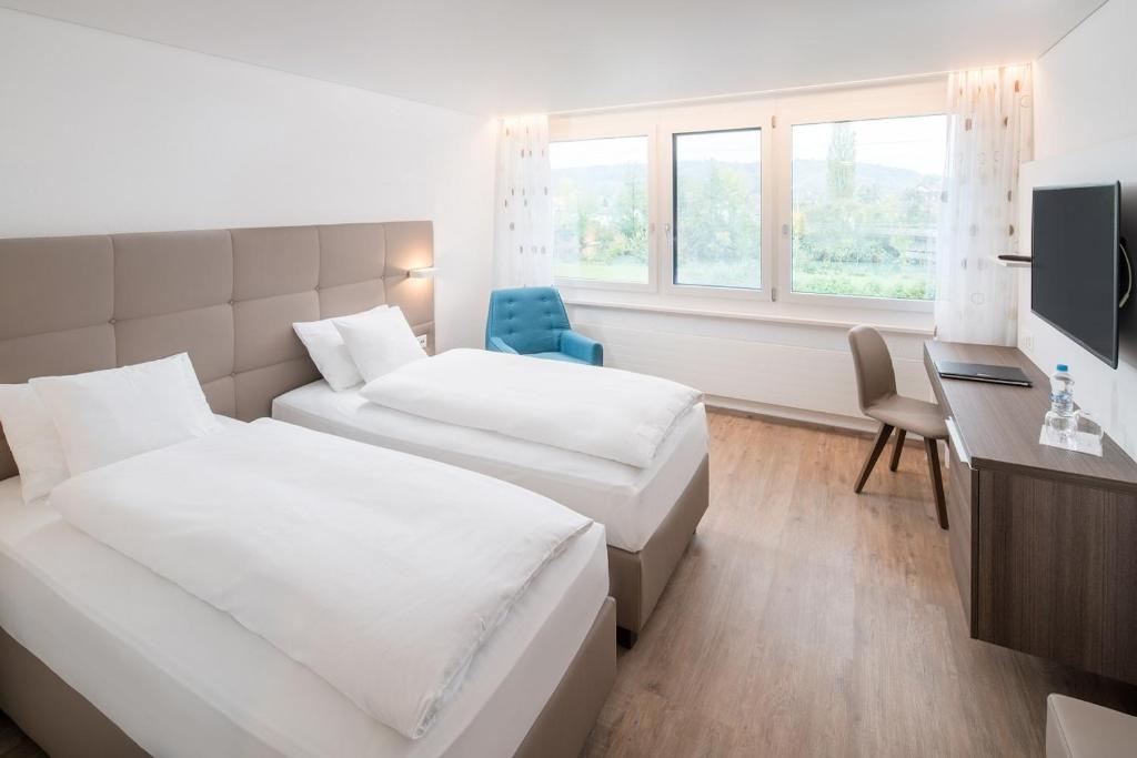 Postel nebo postele na pokoji v ubytování Hotel Al Ponte