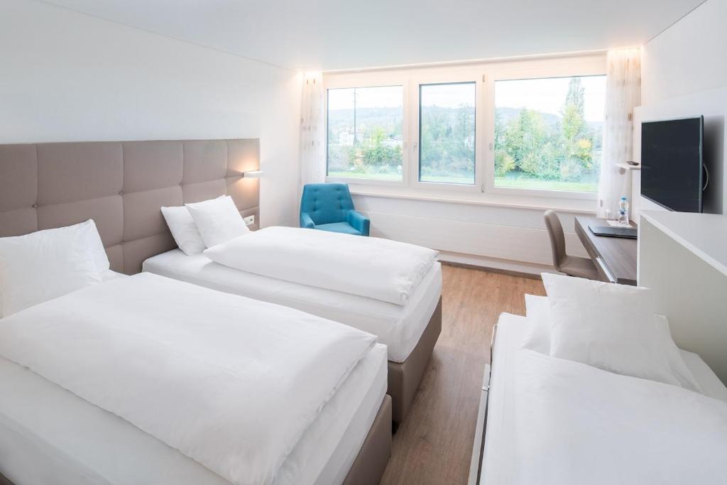 Postel nebo postele na pokoji v ubytování Hotel Al Ponte