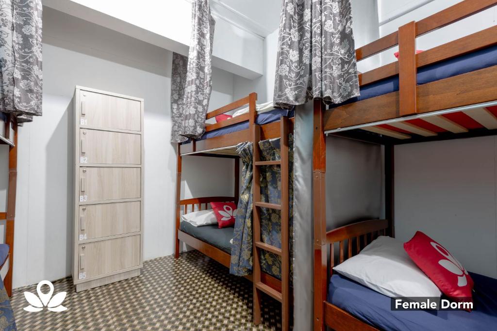 Postel nebo postele na pokoji v ubytování Island Backpackers