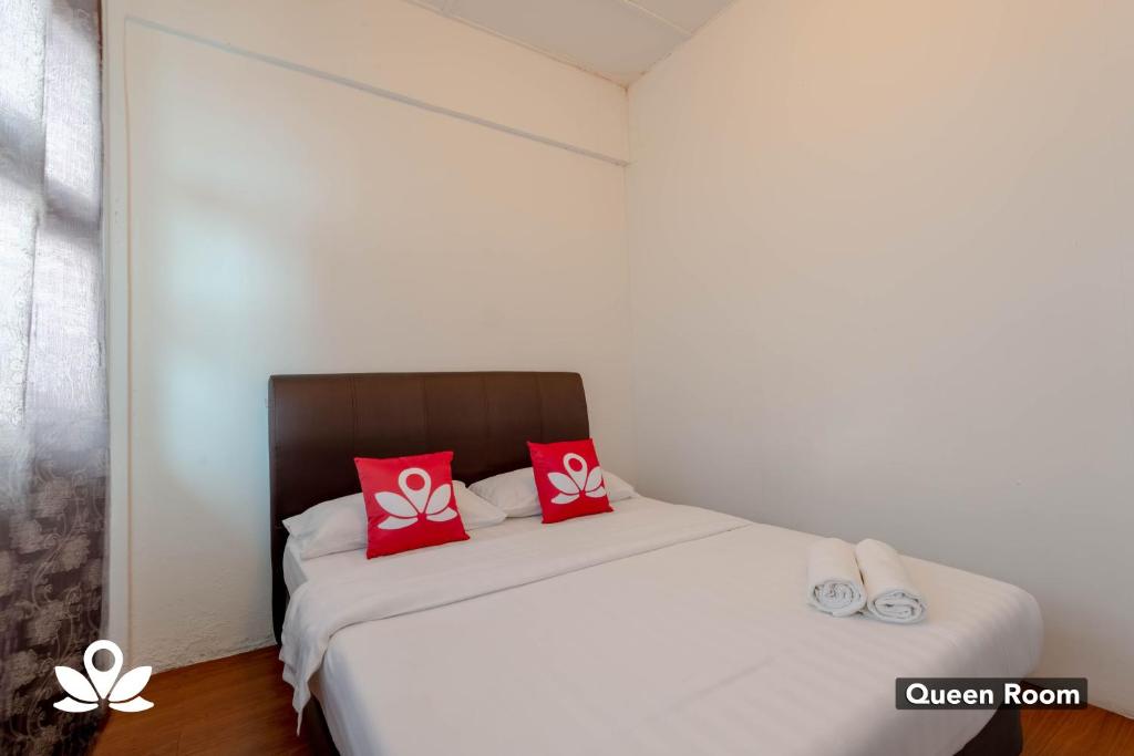 Postel nebo postele na pokoji v ubytování Island Backpackers