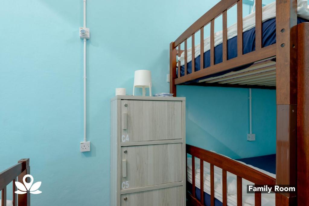 Postel nebo postele na pokoji v ubytování Island Backpackers