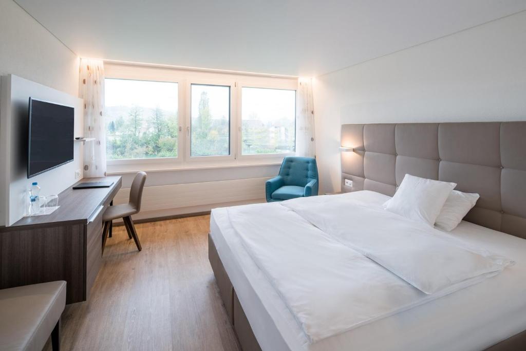 Postel nebo postele na pokoji v ubytování Hotel Al Ponte