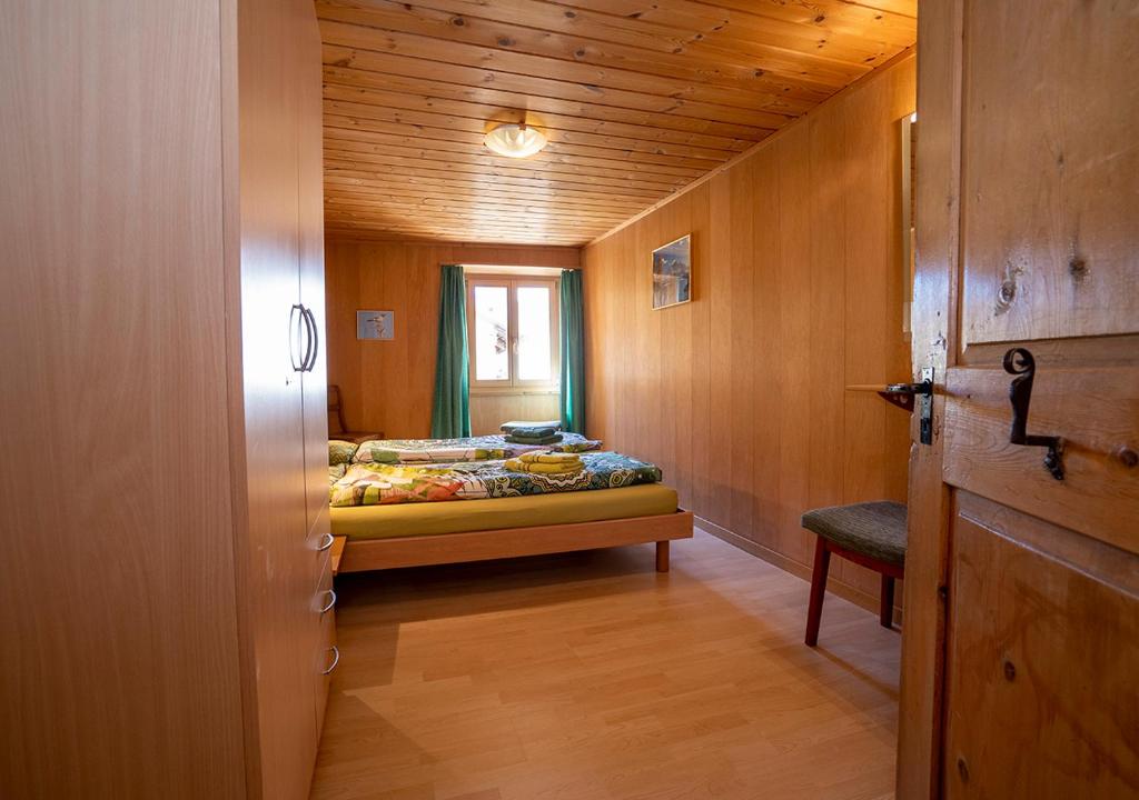 Postel nebo postele na pokoji v ubytování Chasa Werro