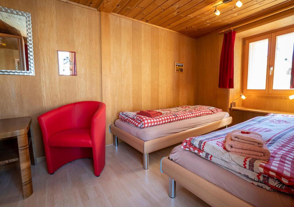 Postel nebo postele na pokoji v ubytování Chasa Werro