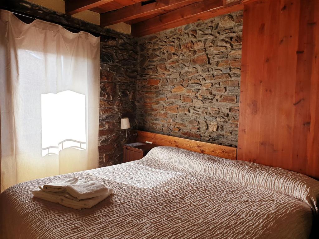 Llit o llits en una habitació de Hostal Rusó SC