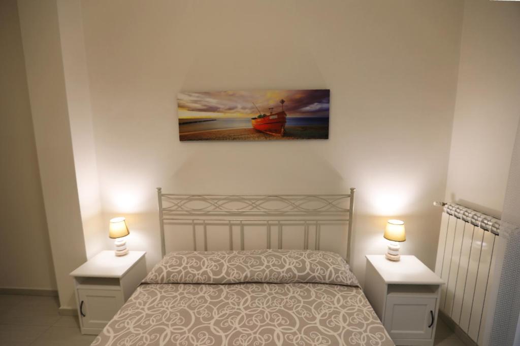 Postel nebo postele na pokoji v ubytování Casa Mascagni