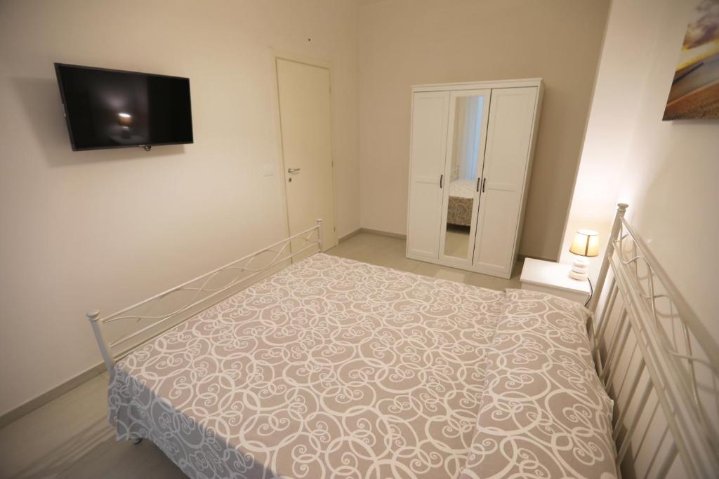 Postel nebo postele na pokoji v ubytování Casa Mascagni