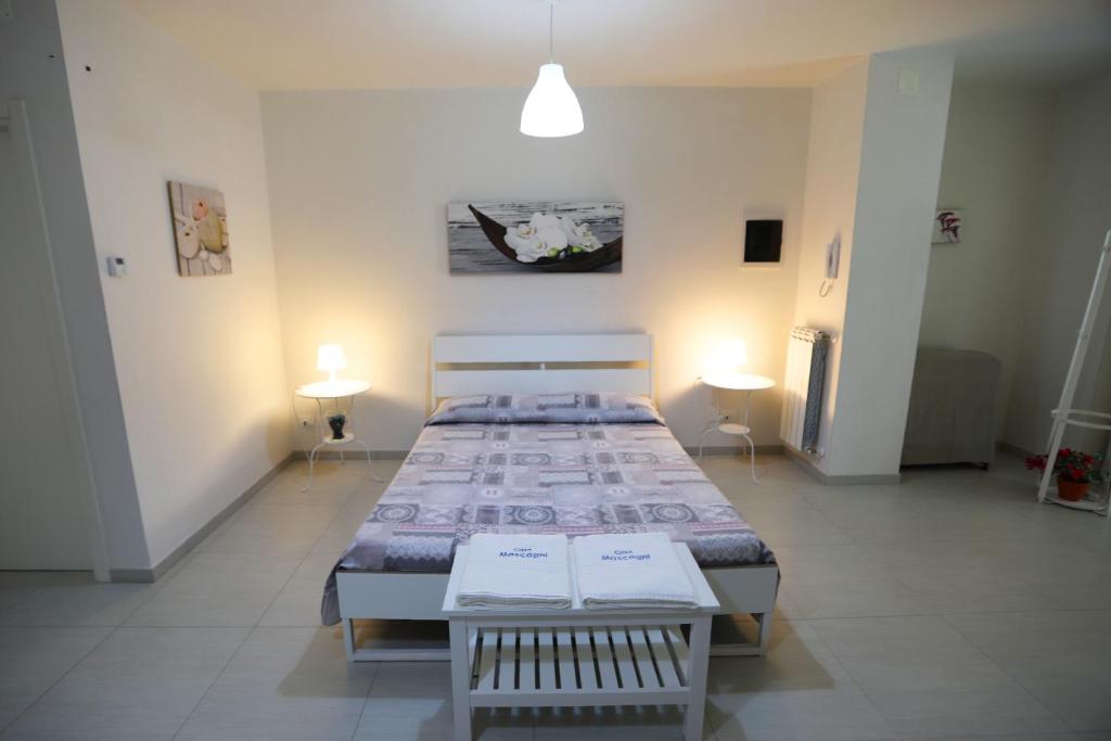 Postel nebo postele na pokoji v ubytování Casa Mascagni