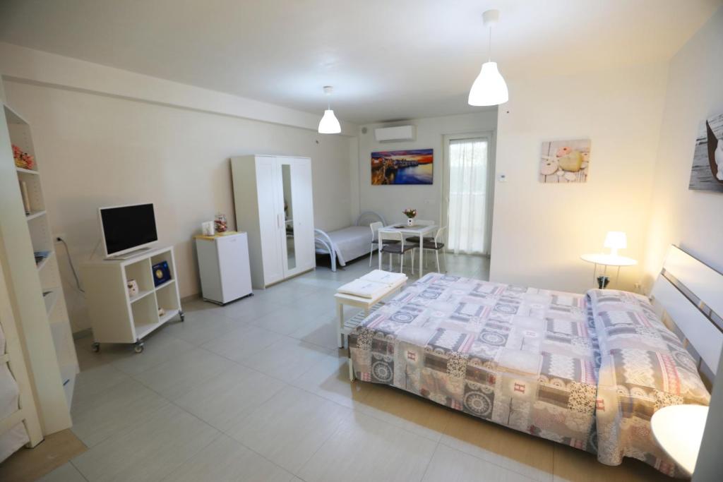 Postel nebo postele na pokoji v ubytování Casa Mascagni