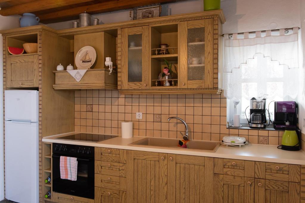 Kuchyňa alebo kuchynka v ubytovaní Efthymia apartments