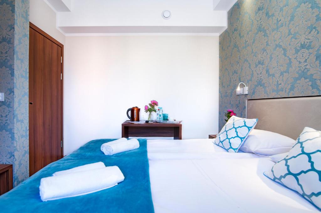 Postel nebo postele na pokoji v ubytování Pod Wzgórzem Bed & Breakfast