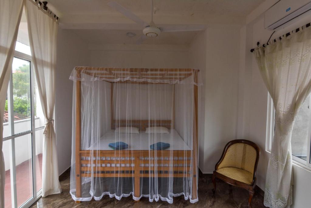 Postel nebo postele na pokoji v ubytování Mallika Resort