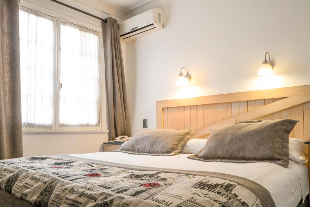 Cama ou camas em um quarto em Hotel Don Efrain