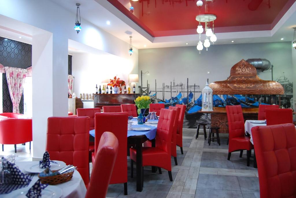 Posezení v ubytování Amigo Hotel