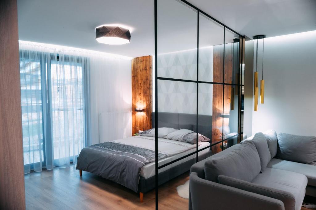 Posteľ alebo postele v izbe v ubytovaní Vistula Terraces Apartment