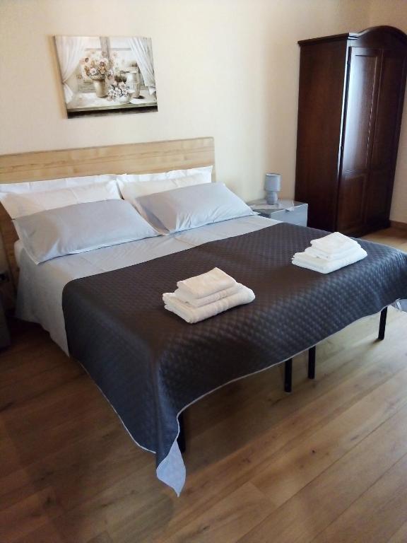 Postel nebo postele na pokoji v ubytování Agriturismo Ai Prüsot