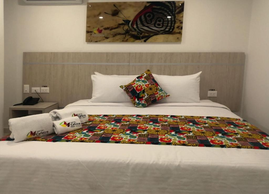 Postel nebo postele na pokoji v ubytování Hotel Cafeira
