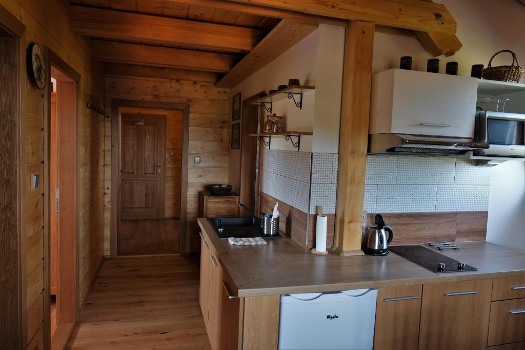 Kuchyň nebo kuchyňský kout v ubytování u mistra vichra