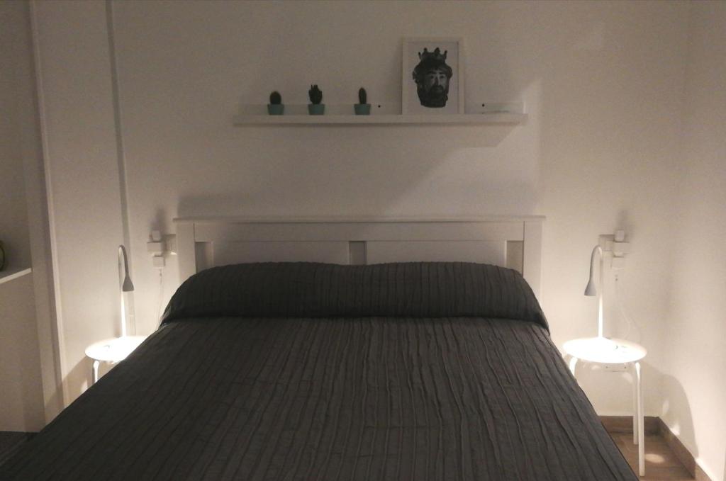 Łóżko lub łóżka w pokoju w obiekcie CATANIA CENTRAL DELUXE HOUSE