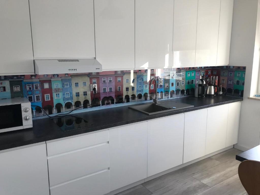 Kuchyňa alebo kuchynka v ubytovaní Apartament Malta Supreme