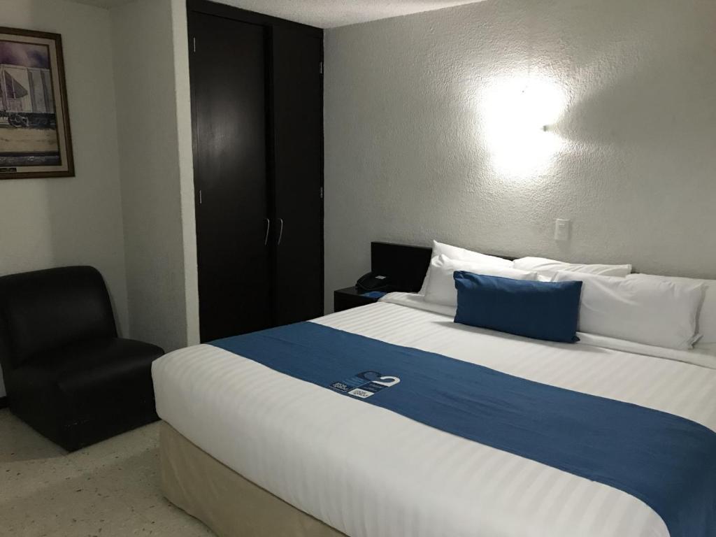 Postel nebo postele na pokoji v ubytování Hotel Ros Gaud