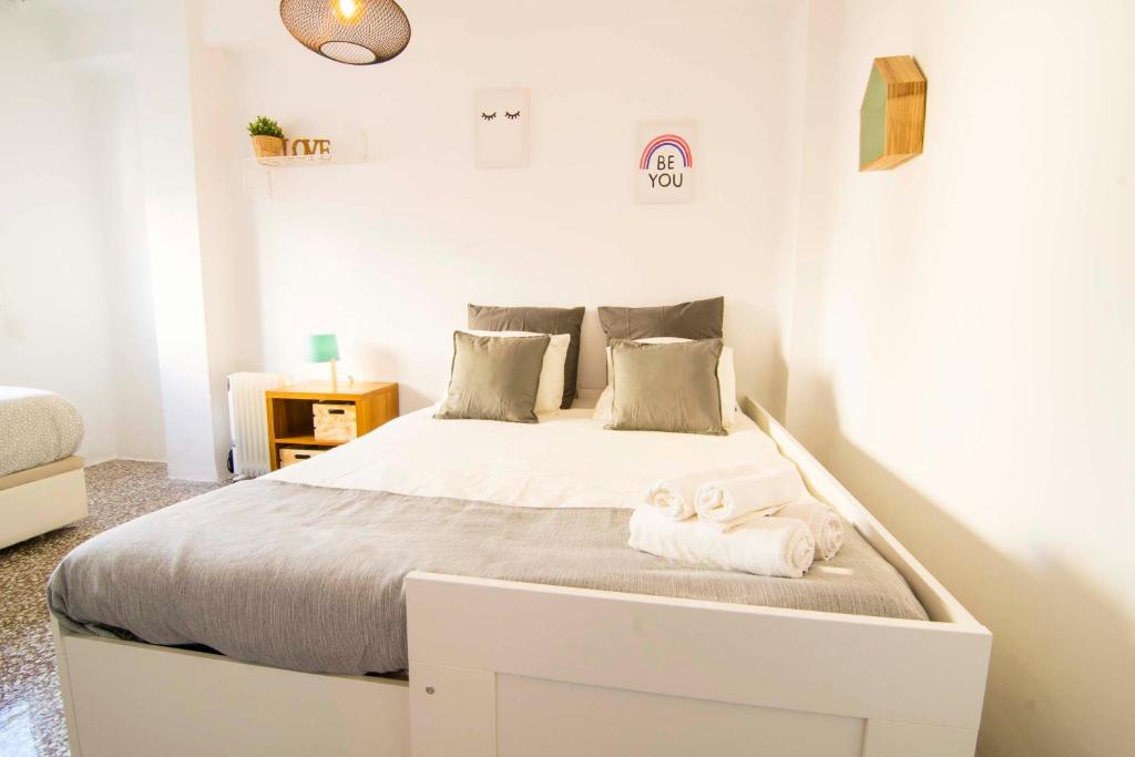 Posteľ alebo postele v izbe v ubytovaní P&P Apartaments Arapiles