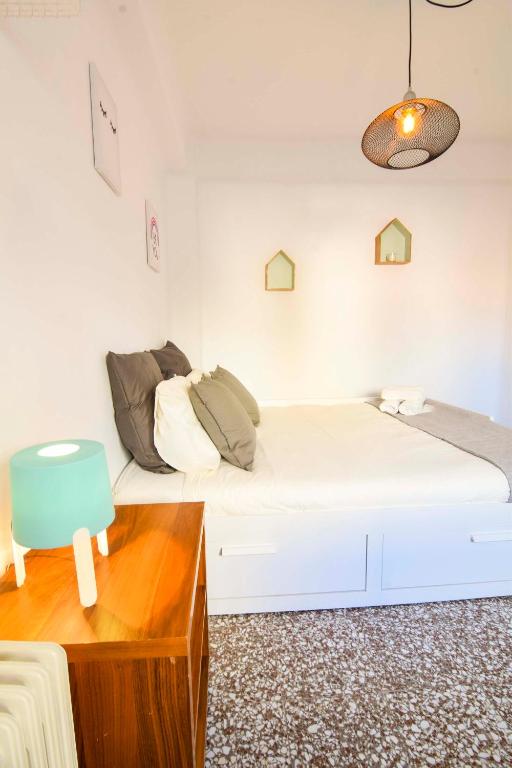 Posteľ alebo postele v izbe v ubytovaní P&P Apartaments Arapiles