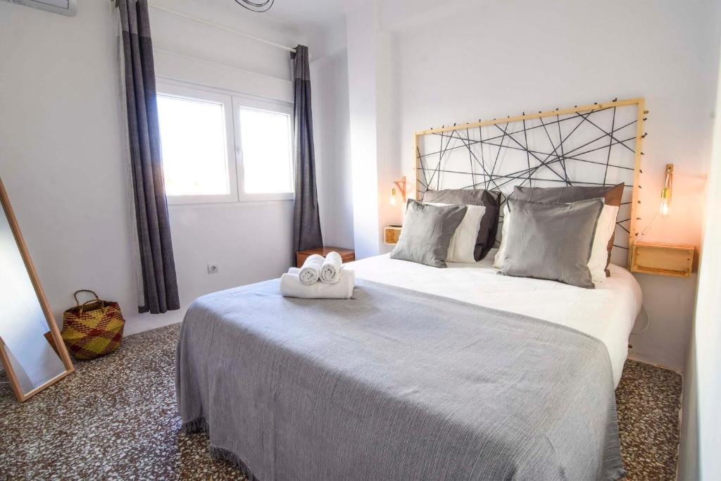 Posteľ alebo postele v izbe v ubytovaní P&P Apartaments Arapiles