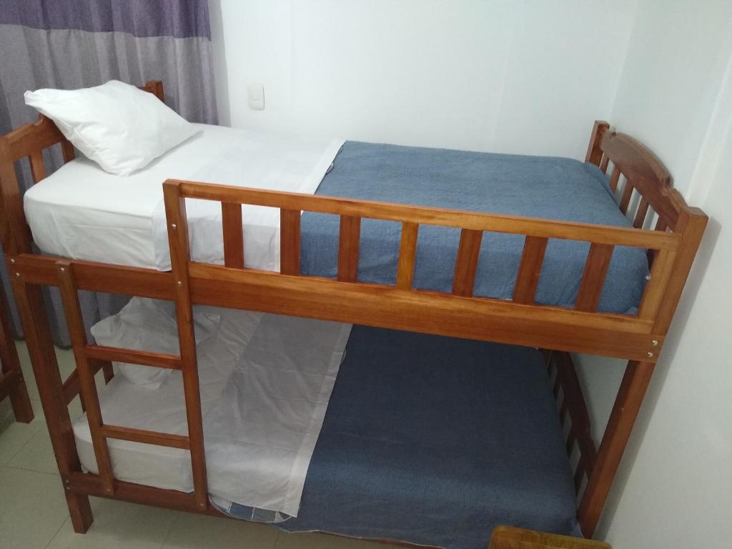 Postel nebo postele na pokoji v ubytování BACHÍG Hospedaje
