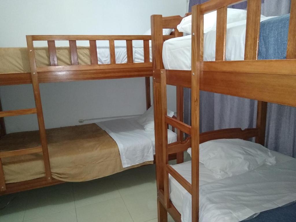 Postel nebo postele na pokoji v ubytování BACHÍG Hospedaje