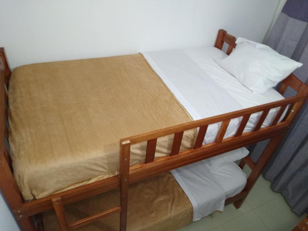 Postel nebo postele na pokoji v ubytování BACHÍG Hospedaje