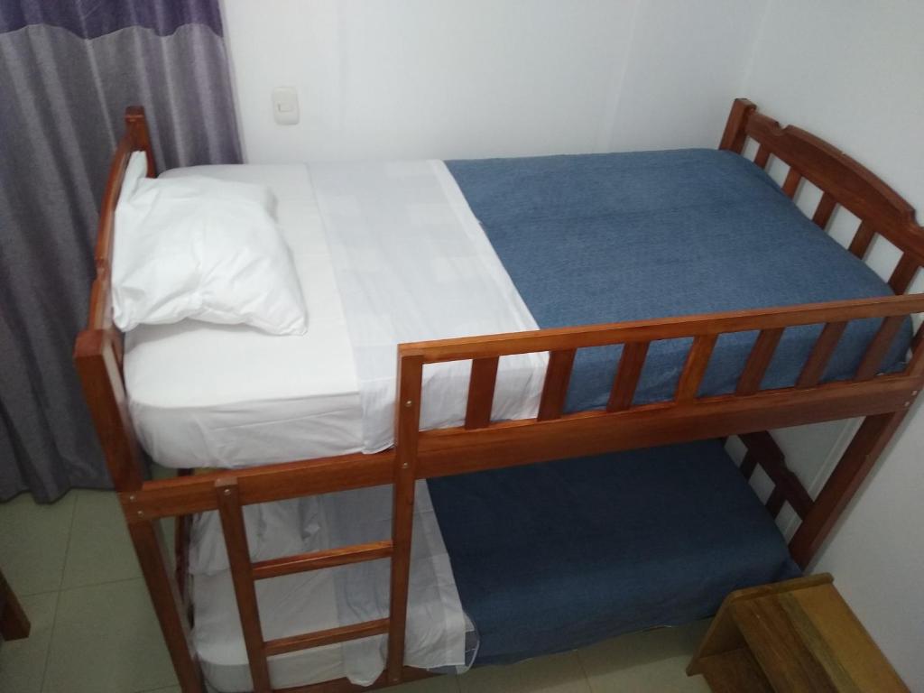 Postel nebo postele na pokoji v ubytování BACHÍG Hospedaje