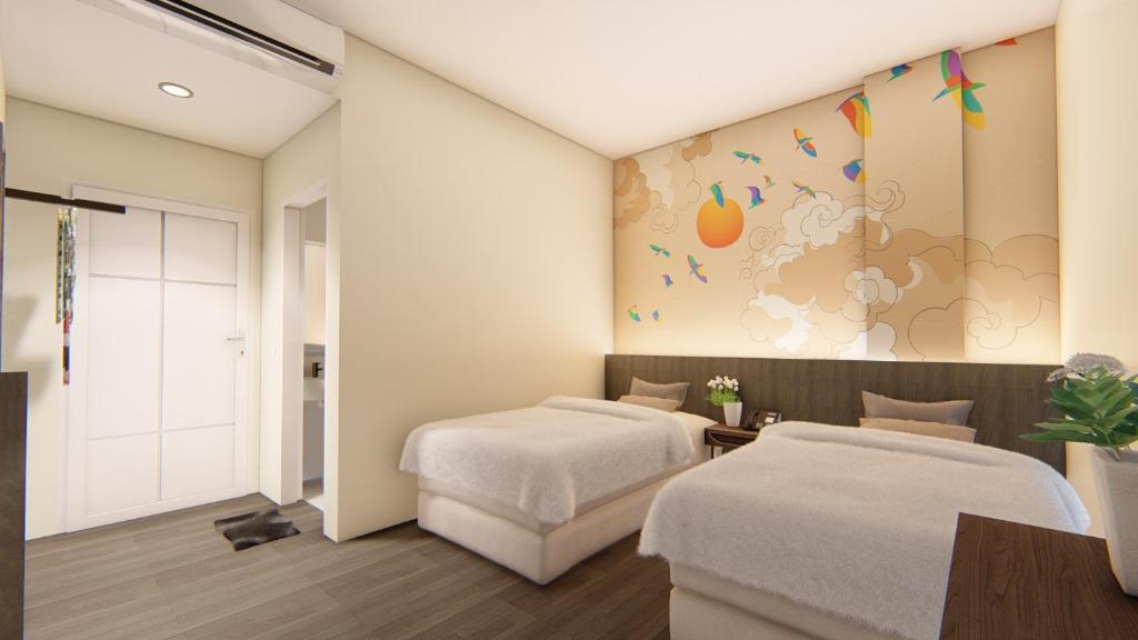 Postel nebo postele na pokoji v ubytování Hotel 88 Alun Alun Bandung By WH