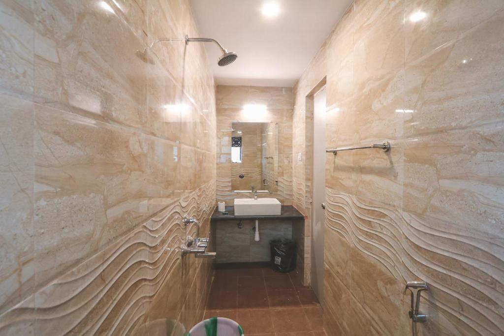 Koupelna v ubytování Amber Rooms