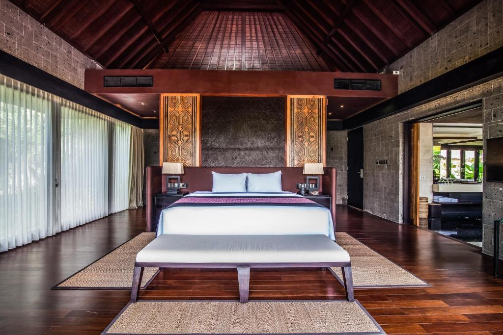 Postel nebo postele na pokoji v ubytování Sanctoo Suites & Villas