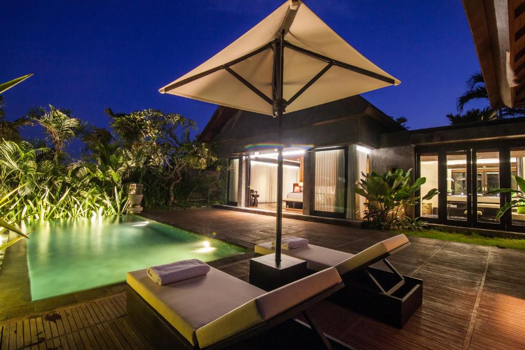 Bazén v ubytování Sanctoo Suites & Villas nebo v jeho okolí